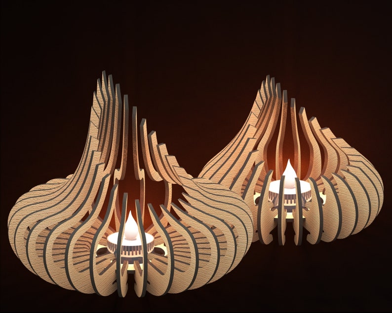 May include: Two wooden candle holders with a geometric design. The holders are shaped like a teardrop and have a small opening at the top for a candle. The candles are lit and glowing.