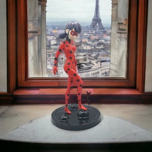 Jouet figurine Ensemble poupée Adrien - Coccinelle miraculeuse et le chat  noir