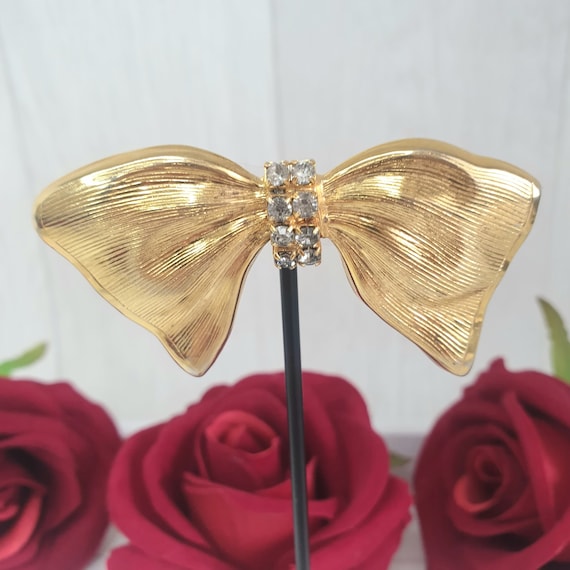 Vintage Gold Tone Crystal Rhinestone Bow Brooch -… - image 1