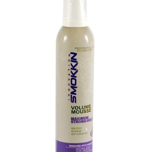 May include: A beige bottle of SMOKKIN Volume Mousse with a white cap. The label features the brand name, product name, and key features like "Maximum Strong Hold." The bottle is designed for professional hair styling.