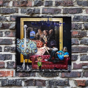 May include: A painting of a colorful scene with a large ostrich, a leopard, a person sitting on a couch, and a small person standing in front of the couch. The painting is framed in gold and has a black background.