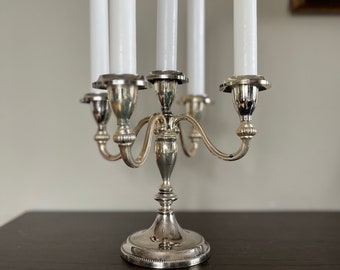 Bellissimo centrotavola candelabro vintage a cinque bracci