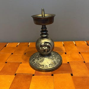 Old Church Candlestick with Virgin Mary and fabulous animals image