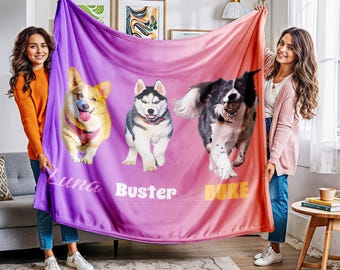 May include: A personalized blanket with a gradient of purple to pink, featuring three dog portraits. The dogs are a Corgi, a Husky, and a Border Collie, each with a name printed below. The blanket is held up by two people.