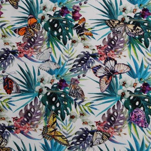 Butterflies & tropical leaves – cotton single jersey with digital print | stretchy knit fabric by the meter