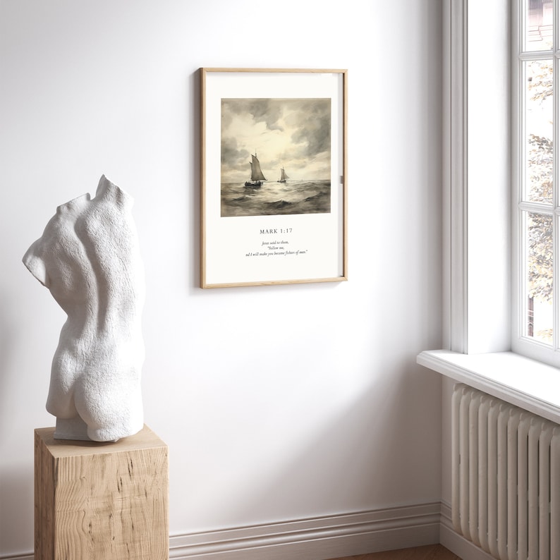 May include: A framed print with a watercolor painting of two sailboats on the water. The print has a white background with the text "MARK 1:17" and a quote from the Bible.