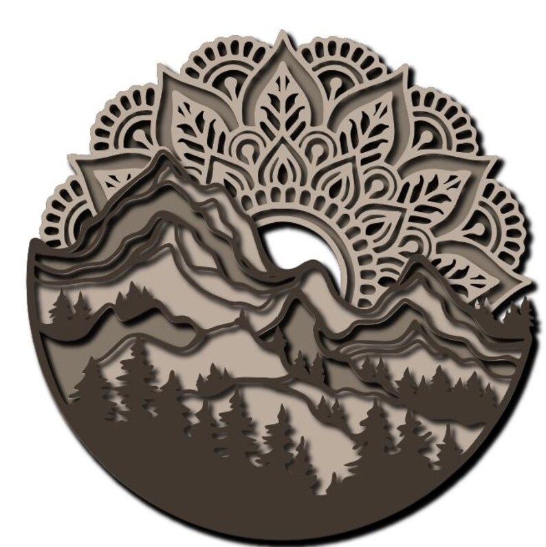 May include: A circular multi-layered wall art piece featuring a dark brown silhouette of a forest at the base, layered mountain ranges in the center, and an intricate, light brown mandala pattern radiating from the top half of the design.