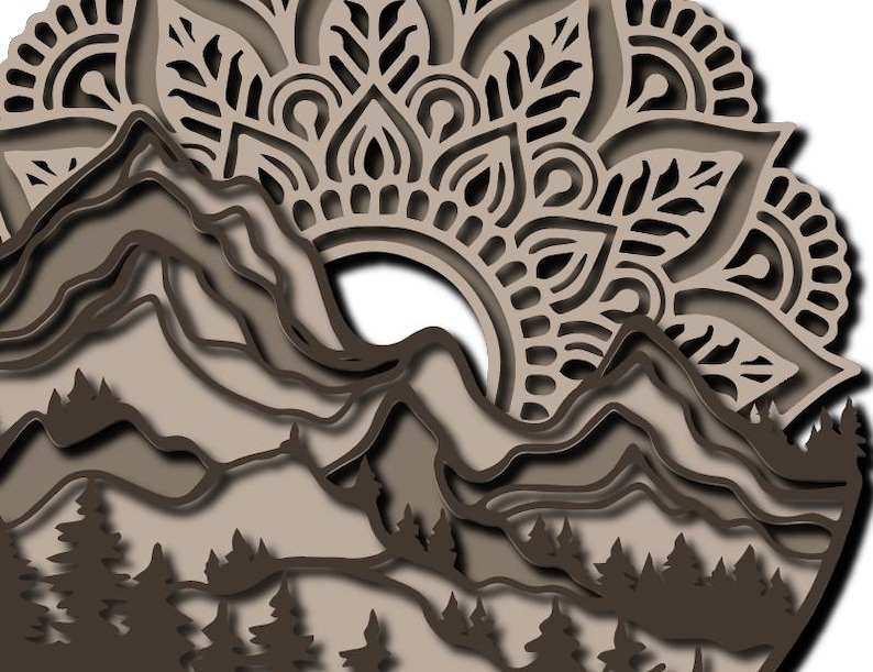 May include: A multi-layered wall art piece featuring a mountain range and a forest of pine trees at the base. Above the mountains, a large, intricate mandala pattern is displayed in shades of light and dark brown, creating a dimensional effect.