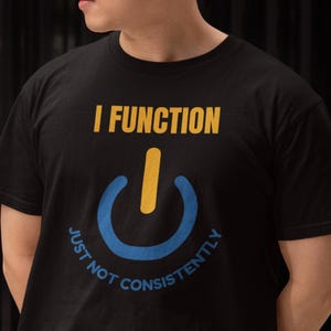 Ik functioneer met de aan/uit-knop op mijn T-shirt | Grappige tech-afbeelding, maar niet altijd even consistent