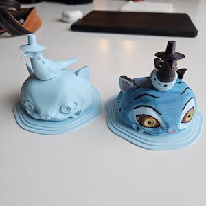 Derpy Tiger descendo e estatueta Sussy Magpie - KPOP DEMON HUNTERS