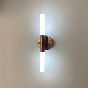 unique wall sconce, modern wall sconce, wall decoration, bedroom sconce, elegant sconce, contemporary sconce, wall design, bedside sconce image 1