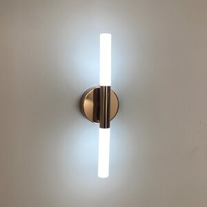 unique wall sconce, modern wall sconce, wall decoration, bedroom sconce, elegant sconce, contemporary sconce, wall design, bedside sconce Rose gold