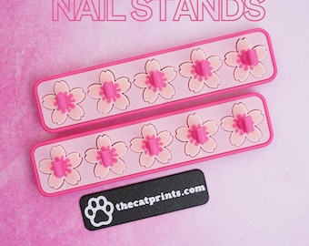 ¡Soportes magnéticos para uñas a presión con forma de flor de cerezo!