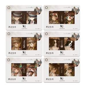 Op de afbeelding: Een set van zes geïllustreerde kaarten met anime-stijl personages en een hond. Elke kaart heeft een uniek ontwerp met de tekst "COMING" en "THE STORM". De kaarten zitten in een witte lijst met een rond gat aan de bovenkant.