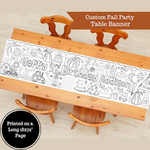 May include: A black and white custom fall party table banner with the text "Happy 3rd Birthday Addison". The banner is printed on an 18x72 inch page and features various fall-themed illustrations, including pumpkins, a tractor, and a scarecrow.