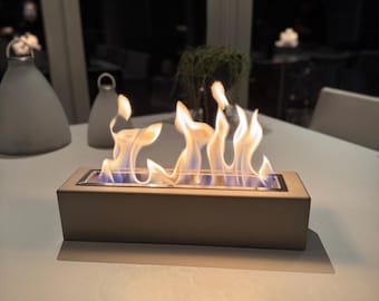 Concrete tabletop fireplace – modern table fire for balcony, terrace, garden & living room