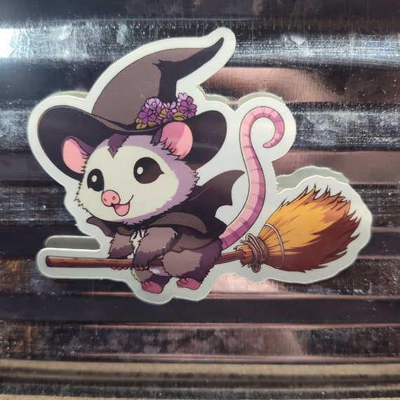 Flying Witch Opossum Vinyl Sticker: Waterproof Laptop Decal