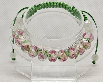 Bracelet pour femme en cordon tressé fait main avec perles de verre travaillées au chalumeau.