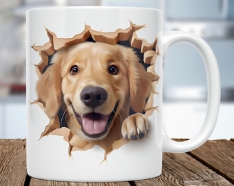 May include: White ceramic mug with a golden retriever dog peeking out of a hole in the mug. The dog has a brown nose and is smiling with its tongue sticking out.