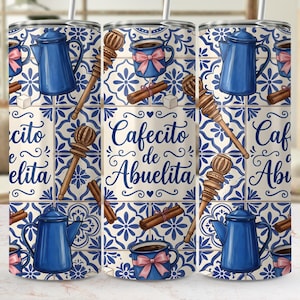 May include: A stainless steel tumbler with a design featuring blue coffee pots, mugs with pink bows, wooden stirrers, and cinnamon sticks on a blue and white tile pattern. The text "Cafecito de Abuelita" is displayed in the center.