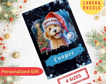 May include: A personalized Christmas puzzle featuring a smiling dog wearing a Santa hat with the text "Santa Paws." The dog's name, "Cooper," is displayed on a blue banner. The puzzle is surrounded by festive holiday decorations and the text "4 Sizes."