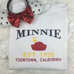 Minnie Mouse Varsity Embroidered Sweatshirt