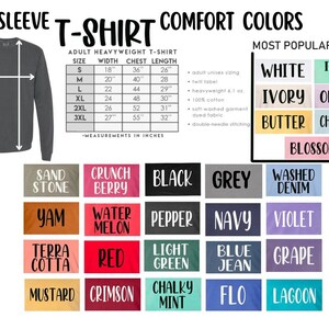 May include: A long-sleeve t-shirt in a dark gray color, with a size chart and color options. The chart shows measurements in inches for sizes S to 3XL. Color options include white, ivory, butter, and blossom.
