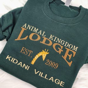 Animal Kingdom Lodge Kidani Embroidered Sweatshirt