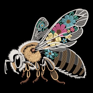 May include: Embroidered bee with a floral design on its wings. The bee is brown and black with white accents. The flowers are pink, yellow, blue, and green.