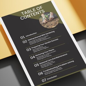 May include: A printed document titled "TABLE OF CONTENTS" with a dark gray and olive green design. The document lists topics including "Getting Started With Gardening", "Preparing Your Garden Success", and "Seasonal Care And Maintenance". A circular image shows hands planting a seedling.