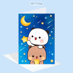 May include: A greeting card featuring a cute cartoon panda and brown bear with a starry night sky background. The panda is holding a yellow star and the bear is holding a yellow star. The card has a crescent moon in the top left corner.