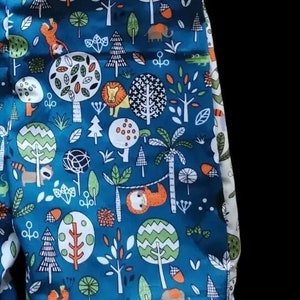 Pantalon à bretelles
