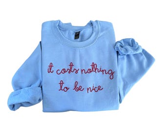 Hand-Embroidered Sweatshirt – "It Costs Nothing To Be Nice" Quote Apparel