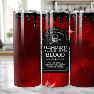 May include: A stainless steel tumbler with a red and black design. The tumbler features a skull and crossbones with the text "Witch Brew Imporium" and "Vampire Blood" on a black label. The text "For use in only the most deadliest potions & spells." is also on the label.