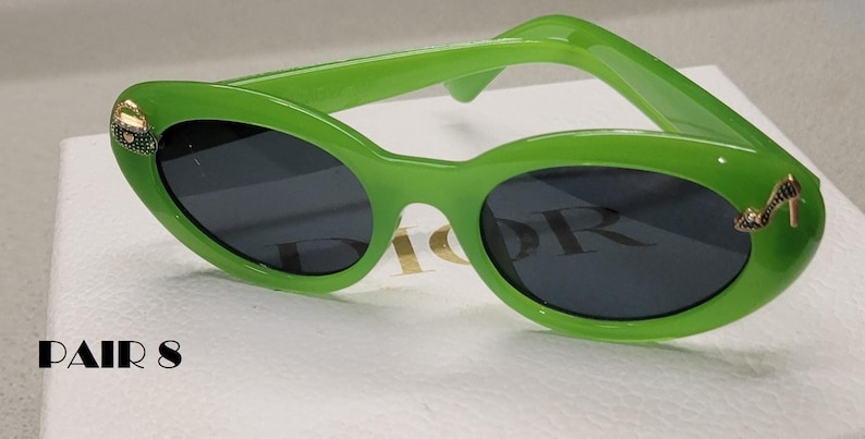 PAIR 8 - Round green cateye frames with jeweled high heel and purse charms