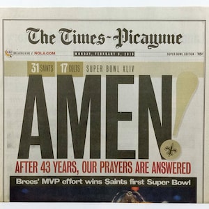 New Orleans Saints - Título do Super Bowl da NFL de 2010 - The Times Picayune - "AMÉM!" - Lacrado e autenticado pela Sports.