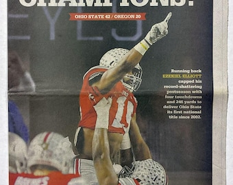 Ohio State Buckeyes - 2015 NCAA BCS Football Title - The Columbus Dispatch - "CHAMPIONS!" - Sealed and Front Cover Sports Authenticated