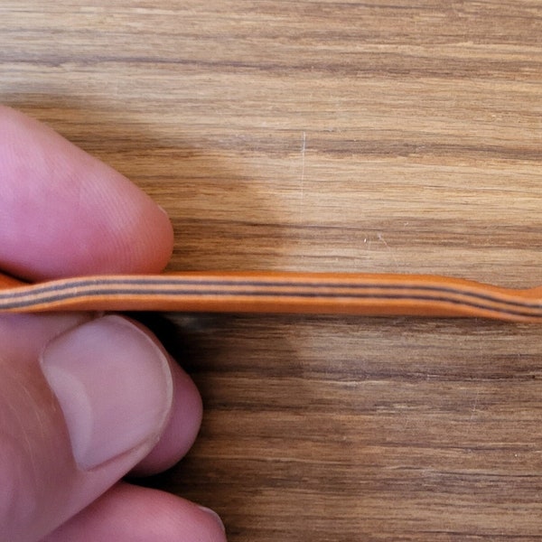 Tastiera professionale da 34 mm in arancione con strati di cioccolato.