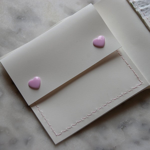 White/pink wallets