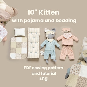May include: A 10-inch kitten doll with pajamas and bedding. The kitten has a gray and white face with a sleep mask. The set includes a blue pajama set, a pink pajama set, a pillow, and a patchwork quilt. The text says "PDF sewing pattern and tutorial Eng."