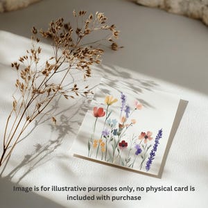 May include: A watercolor painting of a bouquet of wildflowers in shades of pink, red, yellow, and purple. The flowers are arranged in a loose, natural style, and the background is a soft white.