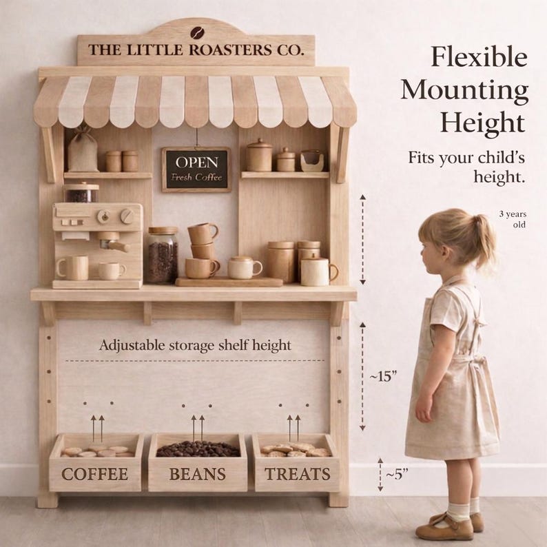 May include: Wooden play coffee shop with a striped awning, featuring the text "THE LITTLE ROASTERS CO." and "OPEN Fresh Coffee." Includes a toy espresso machine, cups, and storage bins labeled "COFFEE," "BEANS," and "TREATS." The adjustable shelf height is approximately 15 inches.