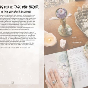 May include: An open book with the title "BEGLEITUNG DER 12 TAGE UND N&Auml;CHTE" and the text "DIE HEILIGEN 12 TAGE UND N&Auml;CHTE BEGINNEN". The book is open to a page with the number 54. The book is on a wooden table with a candle, a seashell, and a crystal.