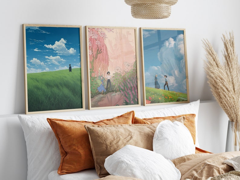 May include: Three framed prints of anime-style artwork depicting couples in nature. The first print shows a couple walking on a grassy hill with a blue sky and clouds. The second print shows a couple standing in a forest with pink flowers and a waterfall. The third print shows a couple walking on a grassy hill with a blue sky and clouds.