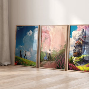 May include: Three framed prints of artwork featuring a whimsical flying house, a couple walking through a field of flowers, and a couple walking through a forest with pink blossoms.