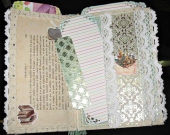 Small green photo album with lace