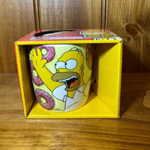 LES SIMPSON - Mug neuf - Homer avec beignets