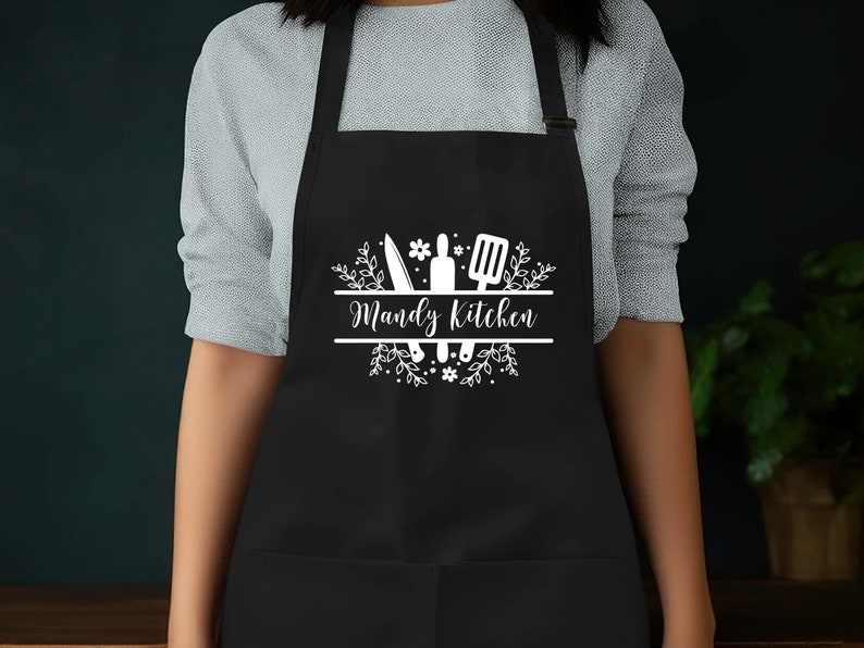 a woman wearing an apron with the words wendy's kitchen on it