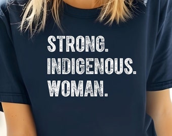 May include: A navy blue t-shirt with the text "STRONG. INDIGENOUS. WOMAN." printed in white.