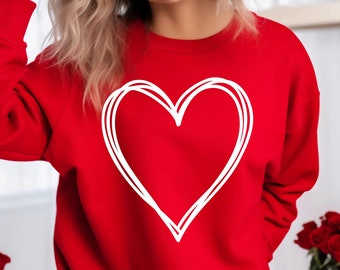 May include: Red sweatshirt with a white outlined heart graphic.